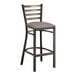 A Lancaster Table & Seating distressed copper finish metal ladder back bar stool with a dark gray vinyl padded seat.