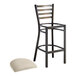 A Lancaster Table & Seating distressed copper metal ladder back bar stool with a light gray cushion.