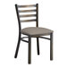 A Lancaster Table & Seating metal restaurant chair with a dark gray vinyl padded seat and ladder back.
