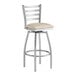 A Lancaster Table & Seating clear coat finish ladder back swivel bar stool with a light gray vinyl padded seat.