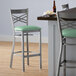 Lancaster Table & Seating Clear Coat Cross Back Bar Height Chair with Seafoam Padded Seat - Preassembled Main Thumbnail 1
