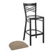 A Lancaster Table & Seating Black Cross Back Bar Stool with a taupe vinyl cushion.