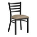 A Lancaster Table & Seating black metal ladder back chair with taupe vinyl padded seat.