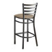 A Lancaster Table & Seating distressed copper metal ladder back bar stool with taupe vinyl padded seat.
