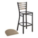 A Lancaster Table & Seating distressed copper metal ladder back bar stool with a taupe cushion.