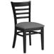 A Lancaster Table & Seating black wood ladder back chair with dark gray vinyl seat.