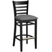 A Lancaster Table & Seating black wood bar stool with a dark gray vinyl seat.