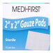 A blue Medi-First box of 10 sterile white 2x2 gauze pads.