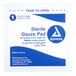 A white and blue Medi-First sterile gauze pad label with white text on a blue background.