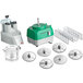 AvaMix Revolution food processor with various accessories on a disc rack.