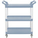 A gray Vollrath utility cart with three shelves and wheels.