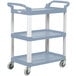 A gray three-tiered Vollrath utility cart with wheels.