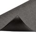 A black rubber Notrax Sof-Tred anti-fatigue mat with a curved corner.