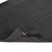 A black Notrax rubber anti-fatigue mat with a black rubber edge.