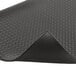A black rubber Notrax Diamond Sof-Tred anti-fatigue mat with a diamond pattern and curved corners.
