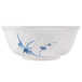 A white melamine bowl with a blue bamboo design.