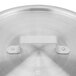 A Vollrath Arkadia stainless steel pan lid with a handle.