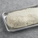 A rectangular tray of Fillo Factory Kataifi Shredded Fillo Dough on a gray surface.