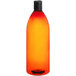 A Bullet Cosmo 32 oz. amber plastic bottle of orange liquid with a black lid.