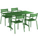 A green Lancaster Table & Seating outdoor table with 4 chairs.
