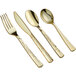 A close-up of Visions Hammersmith Heavy Weight Gold Cutlery spoons.