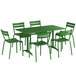 A green Lancaster Table and Seating outdoor table with six chairs.