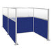 A royal blue H/W-shaped Versare cubicle with glass panels.