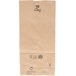 A brown paper bag with black text that reads "Duro 10 lb."