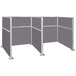 A Versare Hush Panel double cubicle with grey fabric panels.