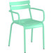 A seafoam green outdoor arm chair.