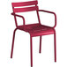 A red outdoor chair with arms.