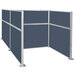 A Versare Hush Panel double cubicle with blue panels and metal frame.