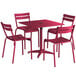 A red rectangular Lancaster Table & Seating outdoor table with four chairs around it.