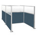 A Versare Caribbean H/W-Shape double cubicle with glass panels.