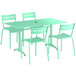 A Lancaster Table & Seating seafoam green powder-coated aluminum outdoor table with 4 chairs.