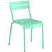 A mint green plastic chair with metal legs.
