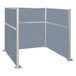 A Versare cubicle with a blue fabric panel and white frame.