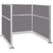 A grey Versare Hush Panel cubicle with white walls.