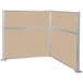 A beige cork cubicle partition with silver metal frame.