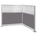 A grey and white L-shape cubicle partition with a grey frame.