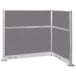 A grey and white Versare Hush Panel L-shape cubicle with electric channel.