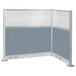 A Versare Hush Panel L-shape cubicle with blue fabric.