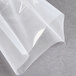 A clear plastic wrapper of ARY VacMaster 8" x 12" chamber vacuum packaging pouches.