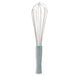 A Vollrath stainless steel French whisk with a green handle.