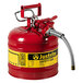 A red metal Justrite safety can with a hose attached.