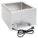 An APW Wyott countertop food warmer with a black cord over a stainless steel container.