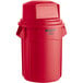 A red Rubbermaid BRUTE 55 gallon trash can with a red lid.