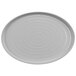 A white oval melamine platter with a spiral pattern.