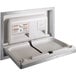 An American Specialties, Inc. stainless steel recessed horizontal baby changing station.