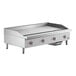 A large stainless steel Cooking Performance Group electric countertop griddle.